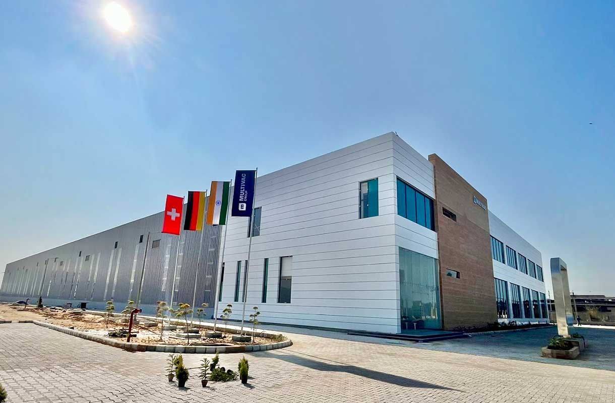 MULTIVAC Factory Exterior Under Clear Blue Sky