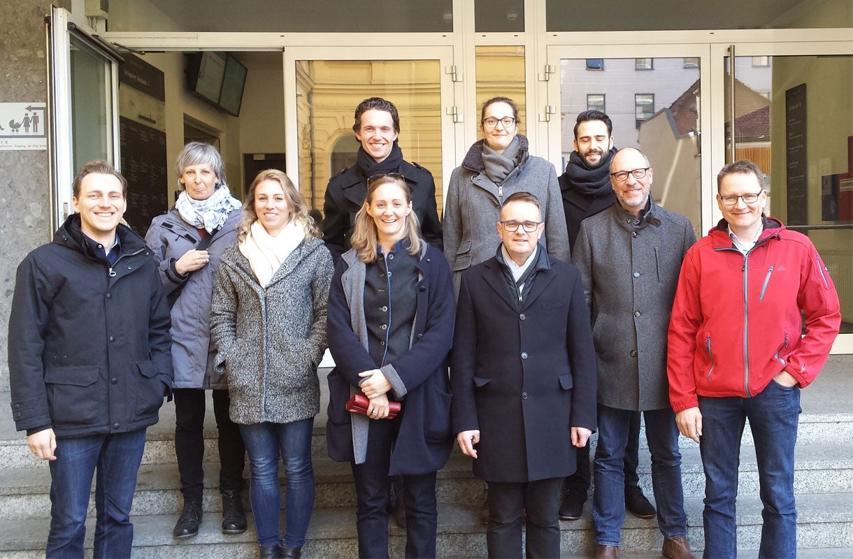 Group Photo Outside Building Entrance