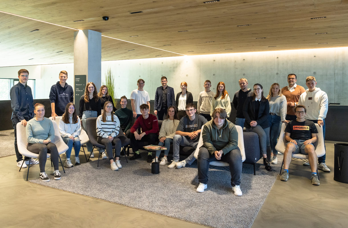 Group Photo in Modern Office Setting